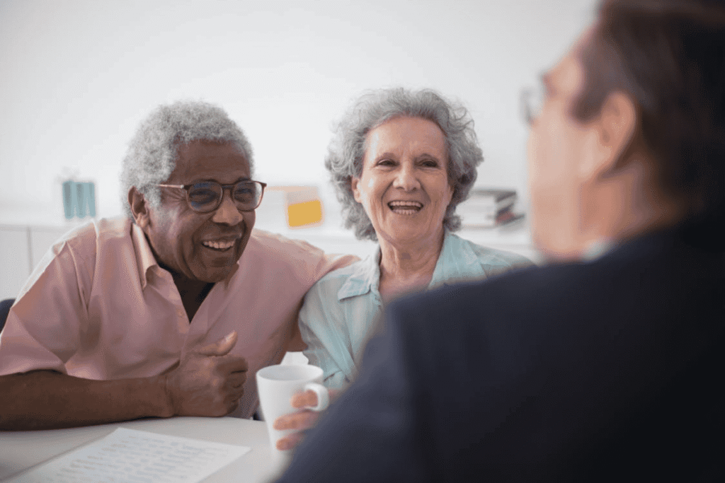 Couple meeting with advisor to learn about board and care homes and personalized senior living options